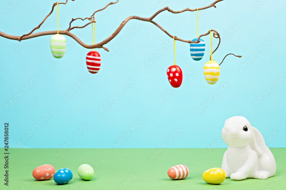 Fototapeta premium Easter bunnies over pastel background