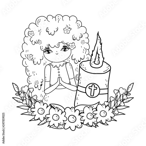 little girl with candle in first communion celebration