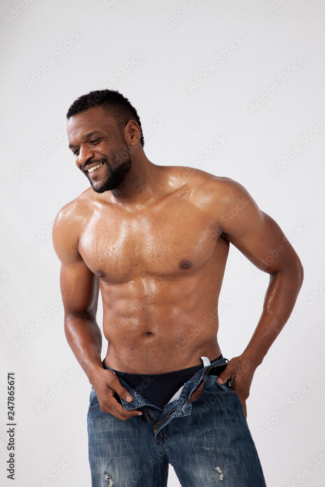 Fototapeta premium Happy Strong Black man with his shirt off