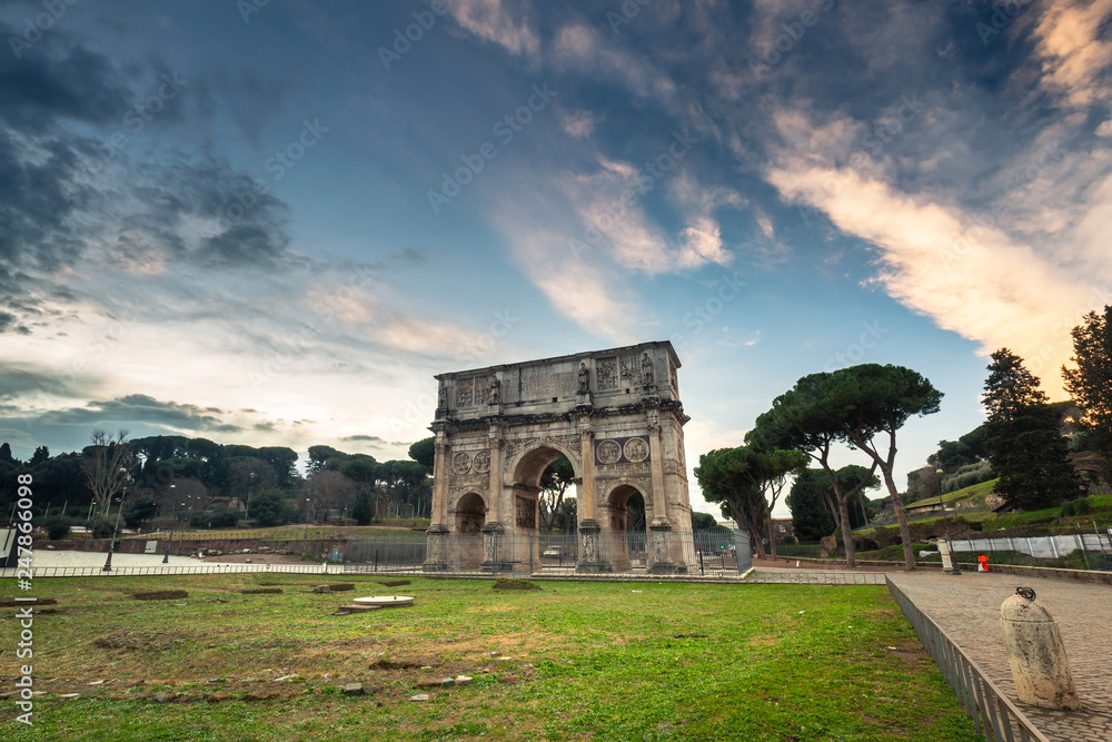 The Arch of Constantine in Rome at sunrise, Italy