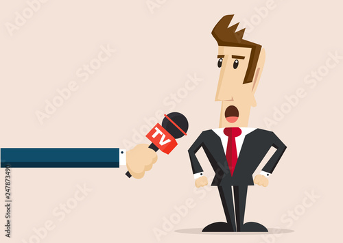 The man in the suit gives an interview to the tv media