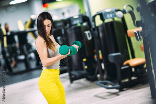 Beautiful fit woman at gym