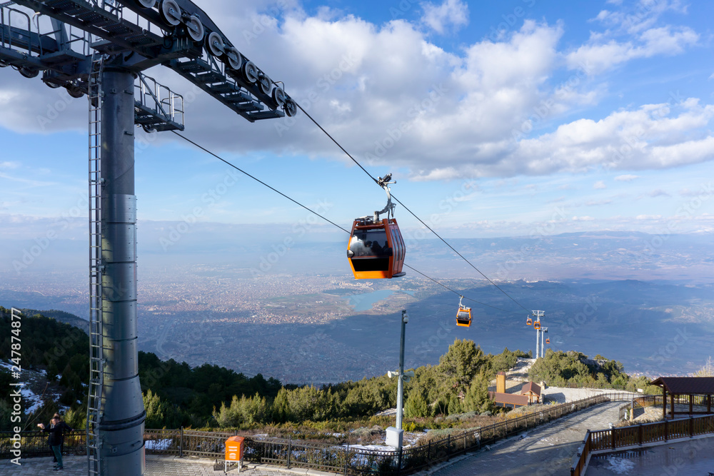 Two ropeway cabs are going up, Denizli, Bagbasi, plateau