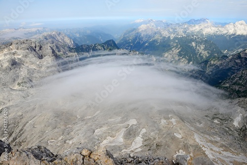 View of mountain peaks, descent from Triglav towards Koca na Dolicu Hut, Triglav National Park, Julian Alps, Slovenia, Europe photo