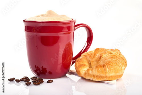 coffee with croissnt on a white background photo