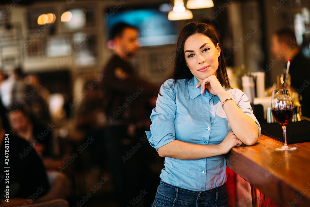Pretty girl at cafe posing