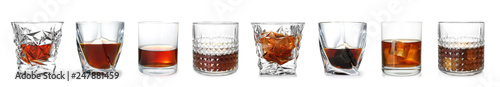 Set of glasses with expensive whiskey on white background