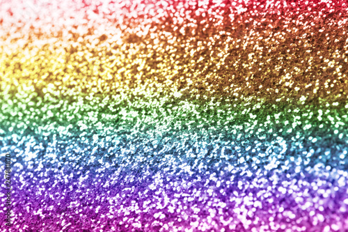 Composition of sparkling rainbow glitter as background