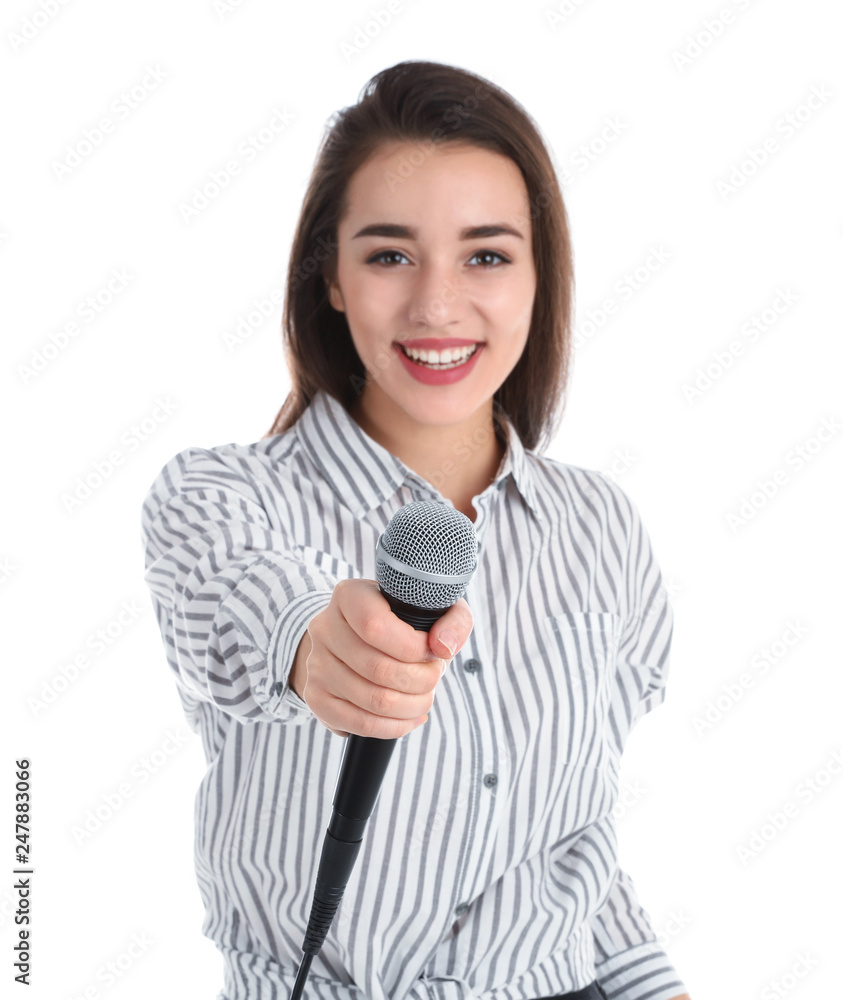 Young woman in casual clothes with microphone on white background Young woman in casual clothes with microphone on white background
