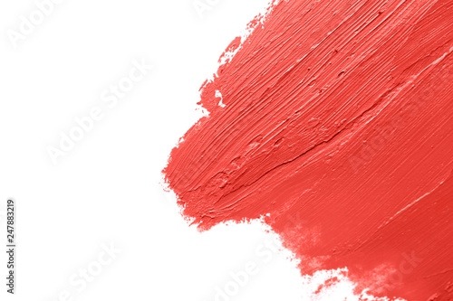 Red lipstick smears on white background, closeup. Space for text