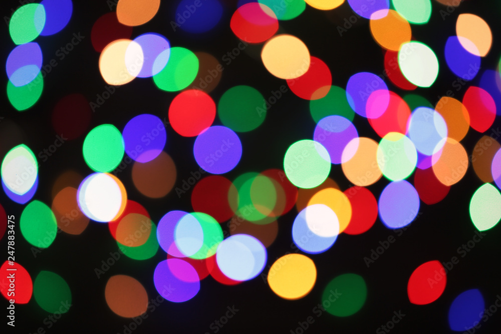 Beautiful colorful lights on dark background. Bokeh effect Beautiful colorful lights on dark background. Bokeh effect