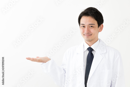 portrait of young asian doctor isolated on white background