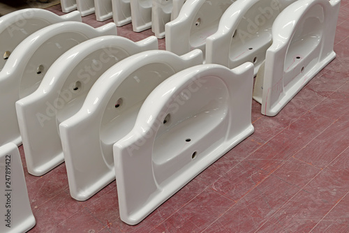 Ceramic toilet parts in a factory