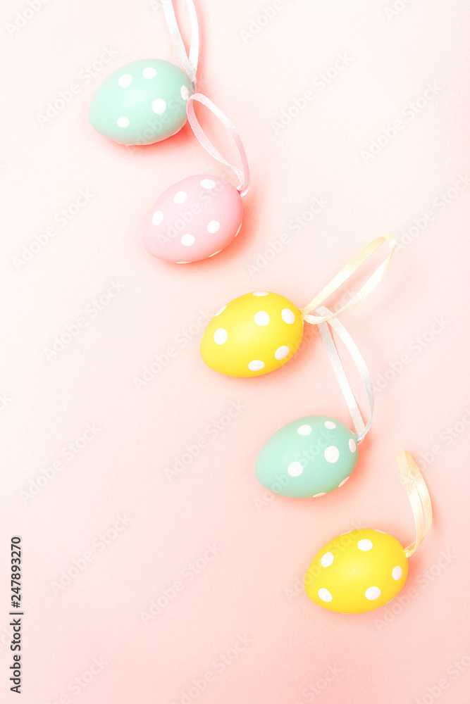 Easter eggs on pastel pink background Easter eggs on pastel pink background