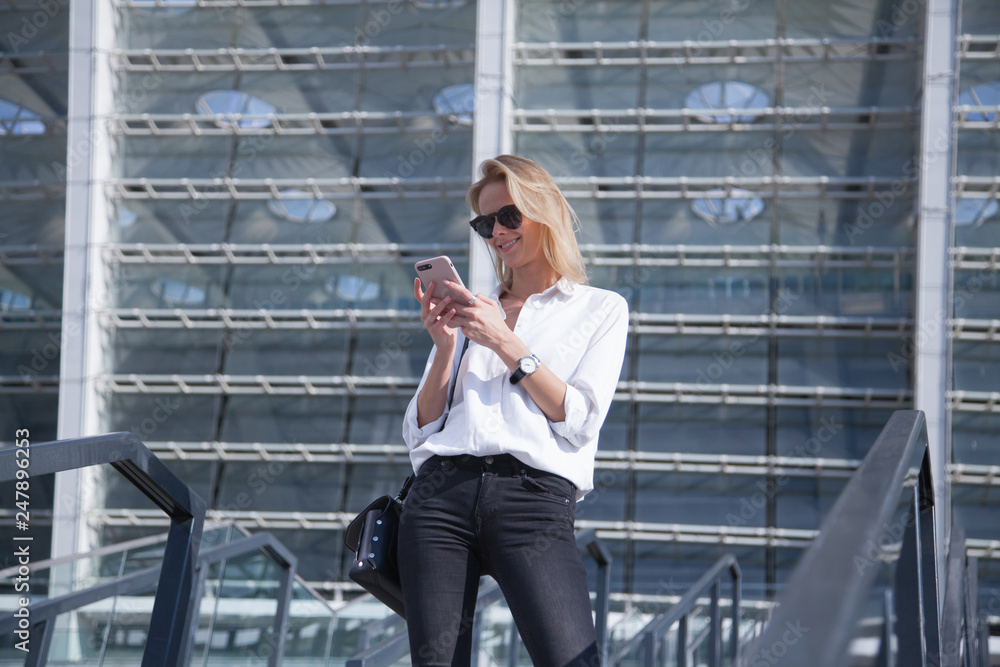 Fototapeta premium Portrait of her she nice lovable fascinating winsome attractive lovely sweet cheerful girl holding cell in hands reading sms