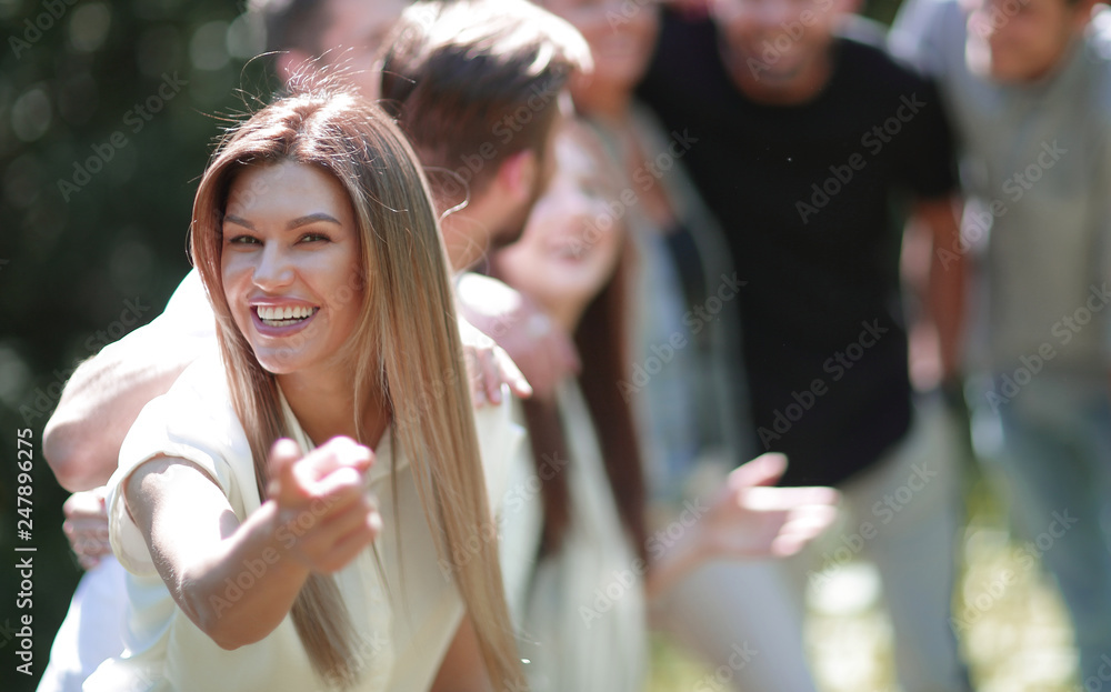 Fototapeta premium modern girl pointing at you.