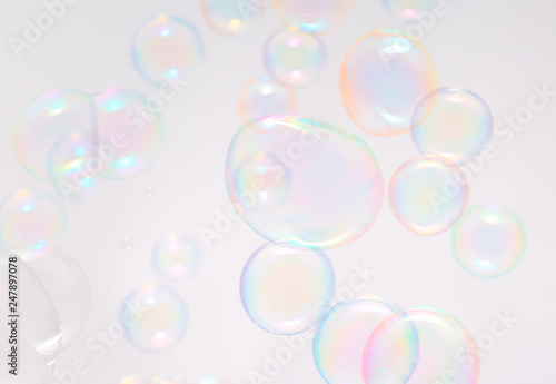 Beautiful soap bubbles float background.