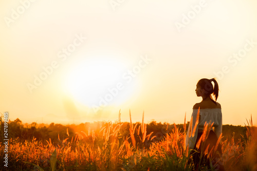 Beautiful Young Woman in a field.