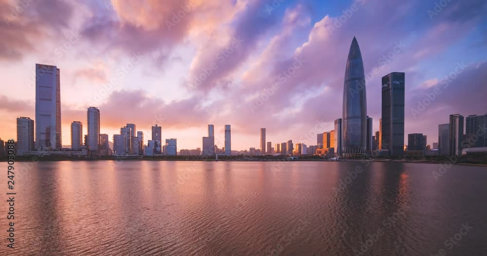 Air view of Talent Park in Nanshan,Shenzhen,China;time lapse buildings under beautiful rosy clouds;colorful lighting show in the evening. Air view of Talent Park in Nanshan,Shenzhen,China;time lapse buildings under beautiful rosy clouds;colorful lighting show in the evening.