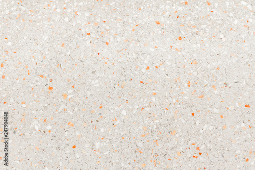 terrazzo flooring which has Orange rock Small or marble old. polished stone wall beautiful texture for background with copy space add text