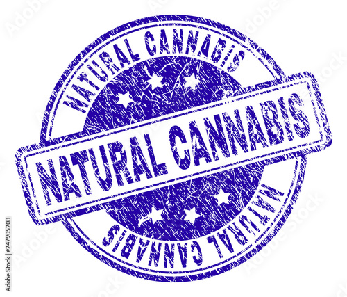 NATURAL CANNABIS stamp seal watermark with distress texture. Designed with rounded rectangles and circles. Blue vector rubber print of NATURAL CANNABIS caption with corroded texture.