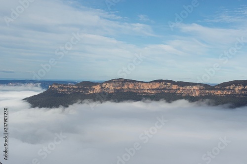 Fototapeta Naklejka Na Ścianę i Meble -  Australian blue mountains amid clouds and fog