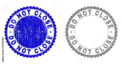 Grunge DO NOT CLOSE stamp seals isolated on a white background. Rosette seals with distress texture in blue and grey colors. Vector rubber stamp imprint of DO NOT CLOSE text inside round rosette.