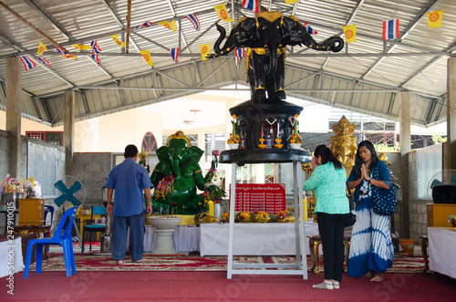 Thai people travel visit and respect praying Ganesh statue or Phra Pikanet at Wat Chong Lom temple in Samut Sakhon, Thailand