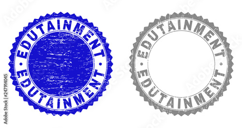 Grunge EDUTAINMENT stamp seals isolated on a white background. Rosette seals with grunge texture in blue and grey colors. Vector rubber stamp imitation of EDUTAINMENT title inside round rosette.
