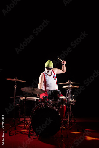Drummer playing on drum set