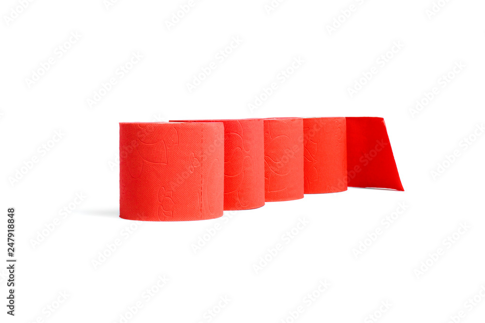 Obraz premium Rolls of red coral toilet paper isolated on white background.