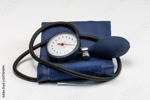 Manual blood pressure sphygmomanometer isolated on white background