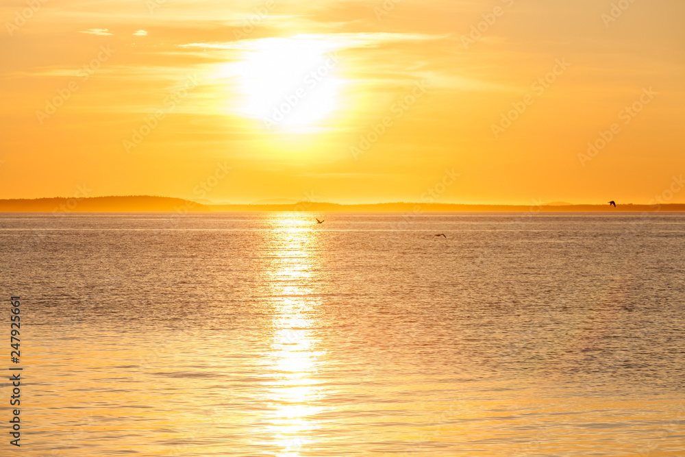 Quiet beautiful golden sunset on the sea. Summer nature background