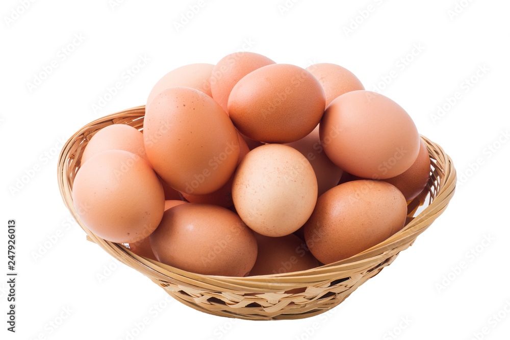 Chicken eggs in basket on isolated white background. Chicken eggs in basket on isolated white background.