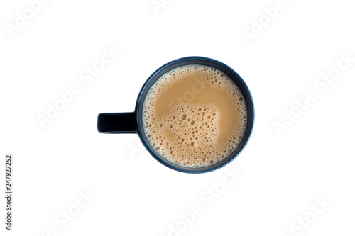 White coffee with milk in a mug view from top isolated over white background
