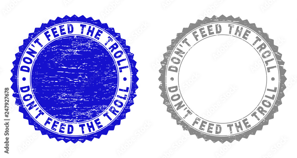 Grunge DON'T FEED THE TROLL stamp seals isolated on a white background. Rosette seals with distress texture in blue and grey colors. Grunge DON'T FEED THE TROLL stamp seals isolated on a white background. Rosette seals with distress texture in blue and grey colors.