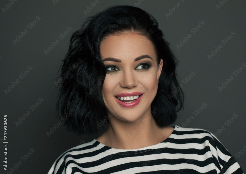 young beauty woman smiling on dark bg studio shot young beauty woman smiling on dark bg studio shot