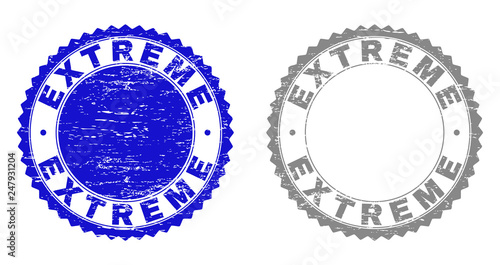 Grunge EXTREME stamp seals isolated on a white background. Rosette seals with grunge texture in blue and gray colors. Vector rubber stamp imprint of EXTREME tag inside round rosette.