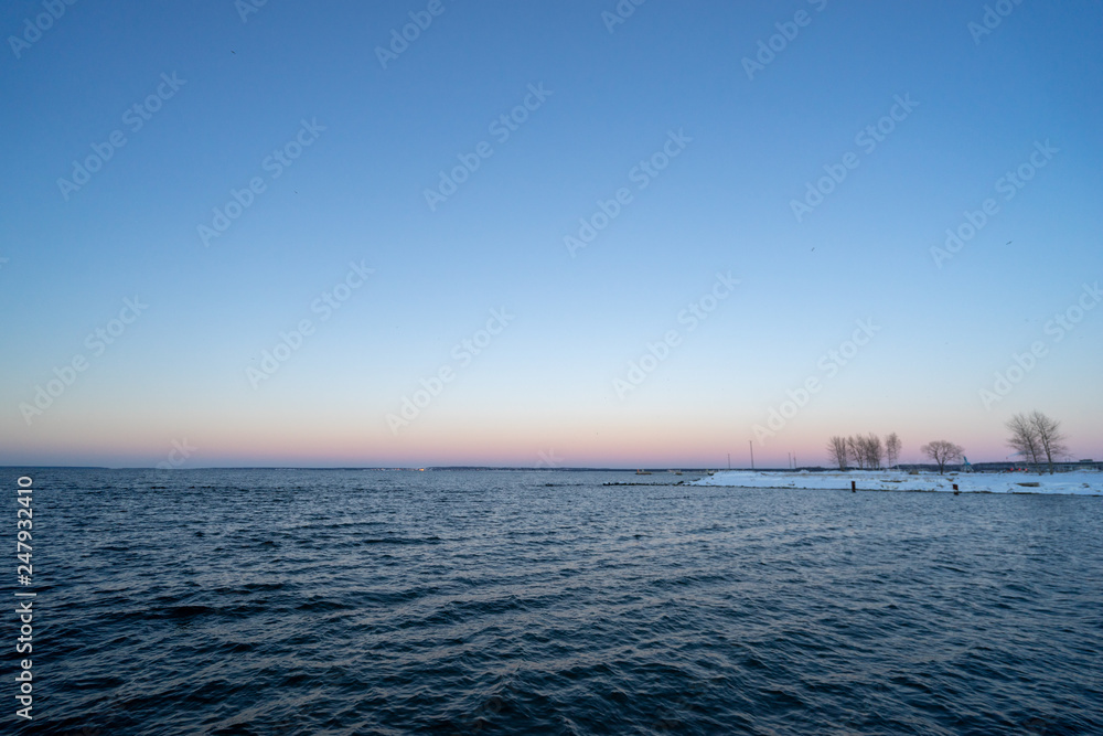 Beautiful winter view of baltic sea with snow and cold water