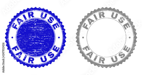 Grunge FAIR USE stamp seals isolated on a white background. Rosette seals with grunge texture in blue and gray colors. Vector rubber stamp imitation of FAIR USE text inside round rosette.