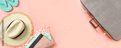 Wallpaper Mural Female outfit for beach and vintage suitcase for travel on pink with space for text. Summer concept. Torontodigital.ca