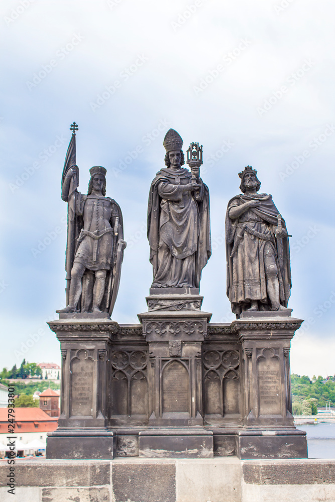 Obraz premium Statues on the Charles Bridge in Prague. Architecture of Prague old town