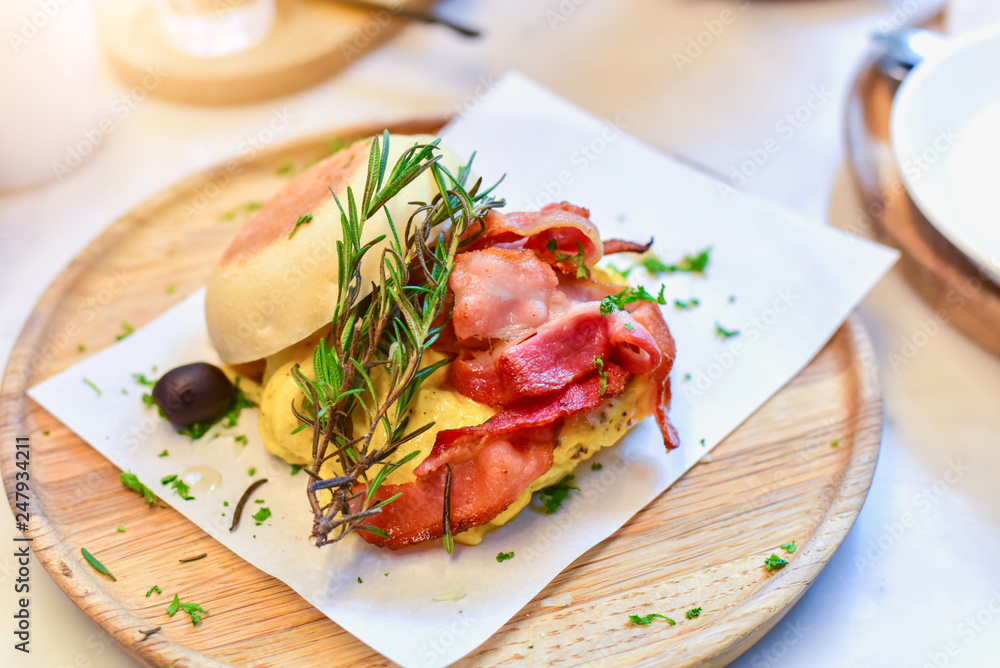 Classic English Muffin Filled with Bacon, Egg, and Rosemary Classic English Muffin Filled with Bacon, Egg, and Rosemary