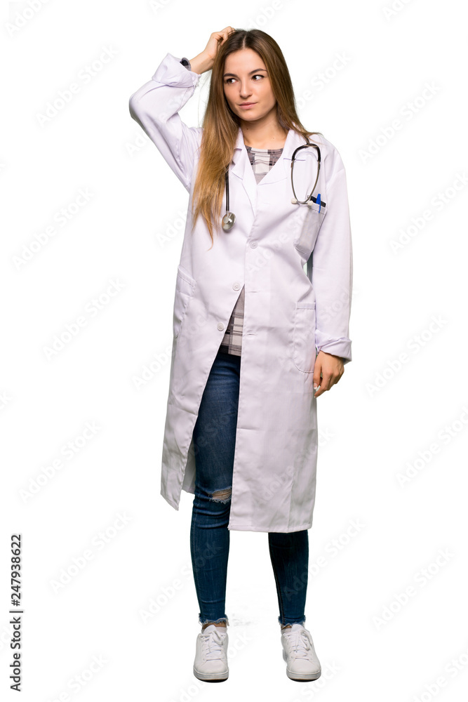 Full body Young doctor woman having doubts while scratching head on isolated background Full body Young doctor woman having doubts while scratching head on isolated background
