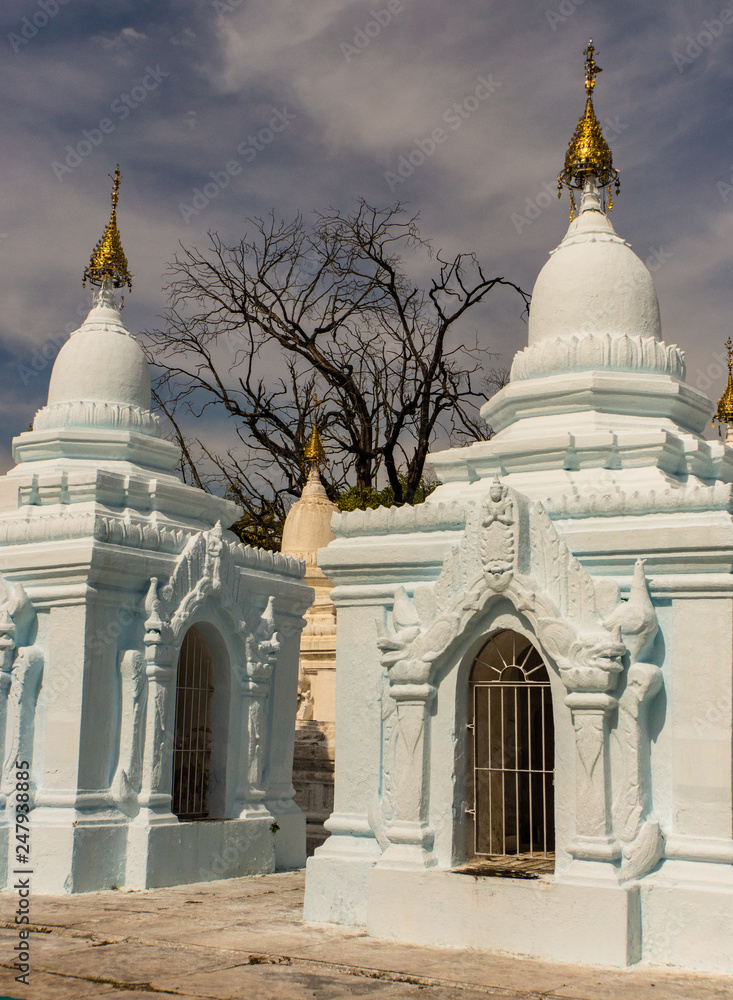 Kuthodaw inscription shrine, a UNESCO heritage site, with the world's largest book with it's hundreds of marble inscribed slabs each housed in white stupas
