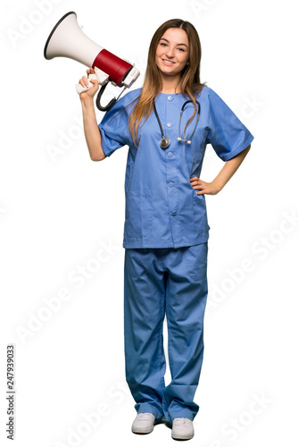 Full body Young nurse holding a megaphone on isolated background