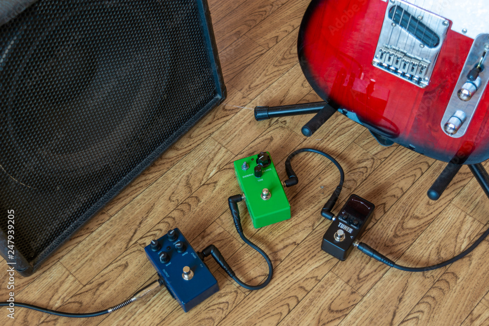 Setting up guitar audio processing effects. Electric guitar stomp box