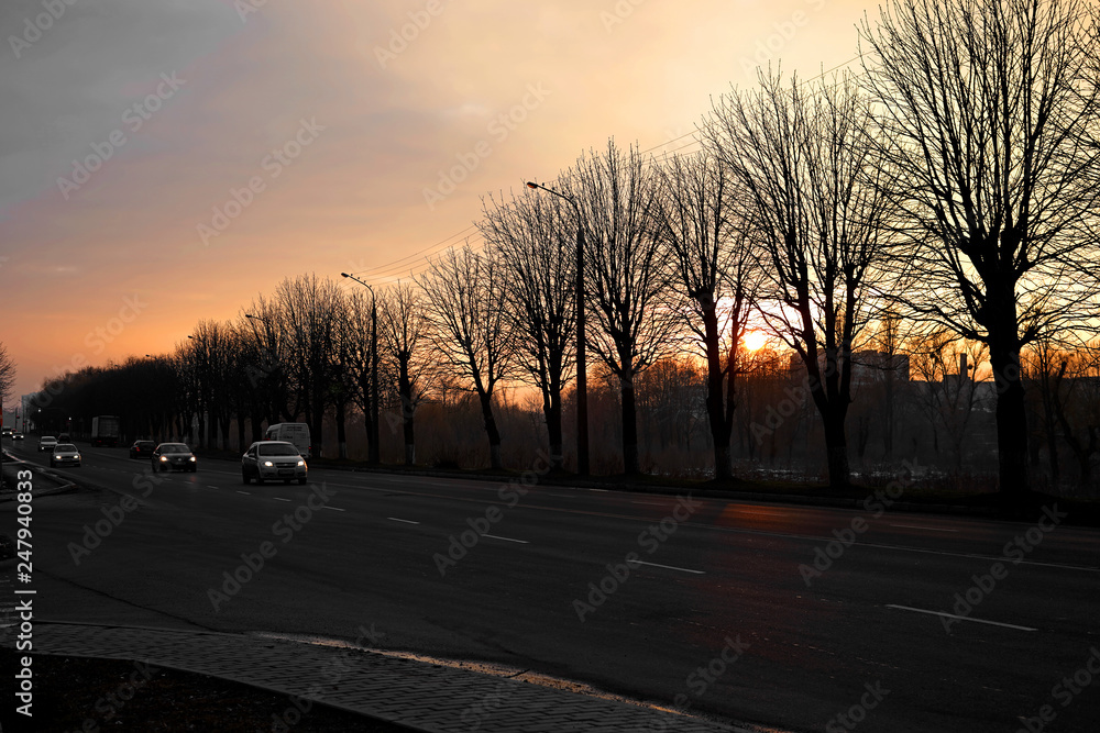 sunset over the road in the city Lutsk, Ukraine sunset over the road in the city Lutsk, Ukraine