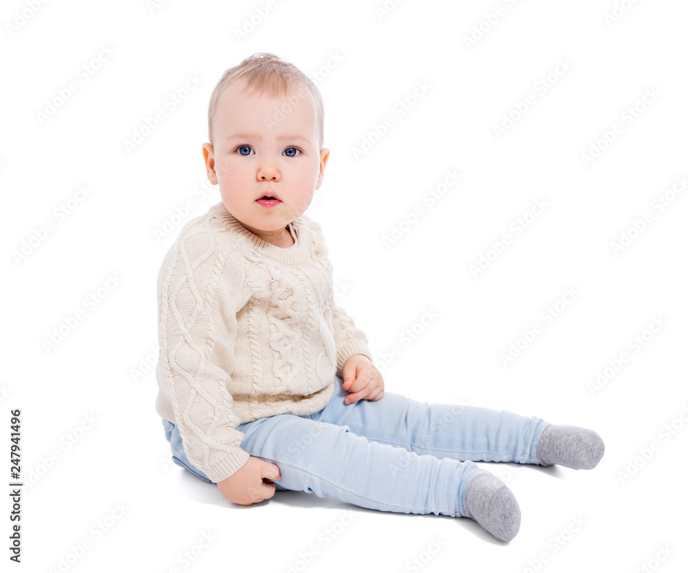 portrait of cute baby girl in winter clothes sitting isolated on white portrait of cute baby girl in winter clothes sitting isolated on white