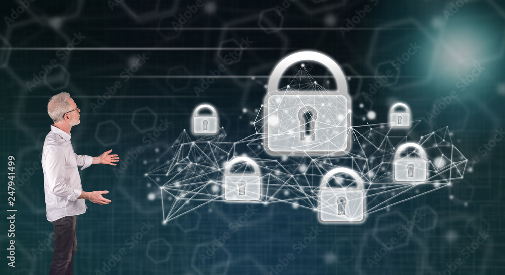 Fototapeta premium A network security concept explained by a businessman on a wall screen
